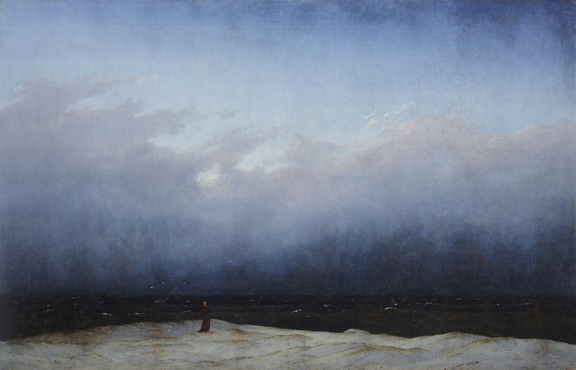 The Monk by the Sea by Caspar David Friedrich, a single small figure on a shore beneath an immense empty sky